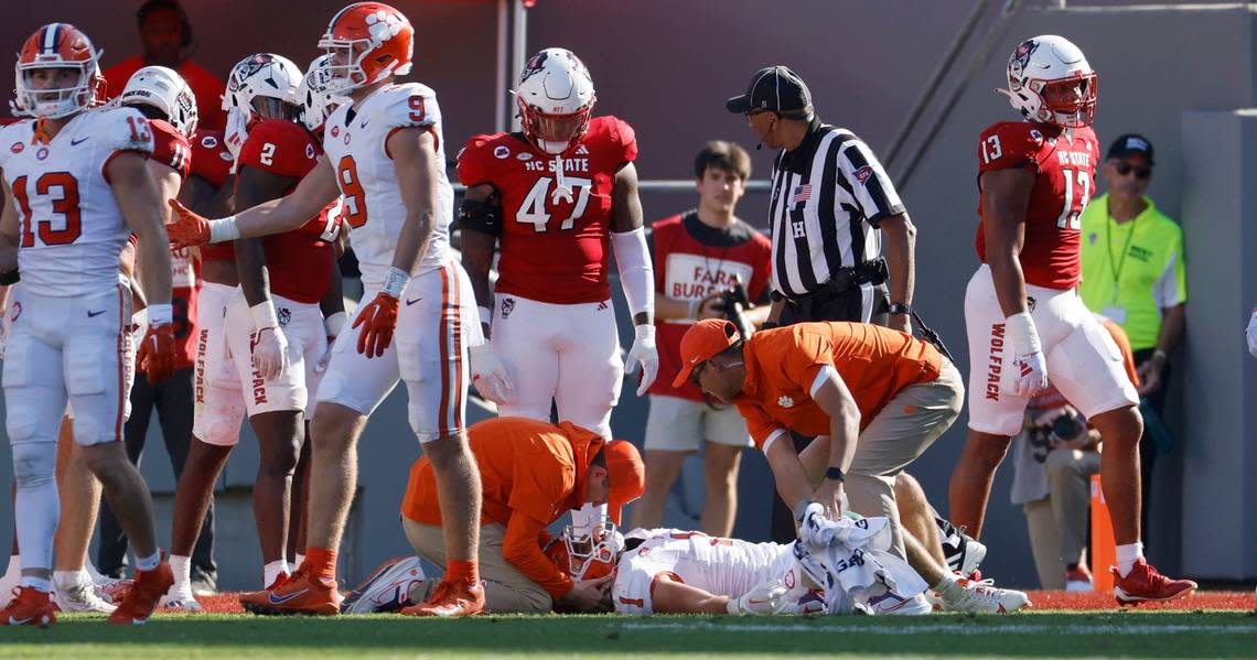 Trainers check on Clemson running back Will Shipley (1) after he was injured during the first half of N.C. State’s game against Clemson at Carter-Finley Stadium in Raleigh, N.C., Saturday, Oct. 28, 2023. Ethan Hyman/ehyman@newsobserver.com