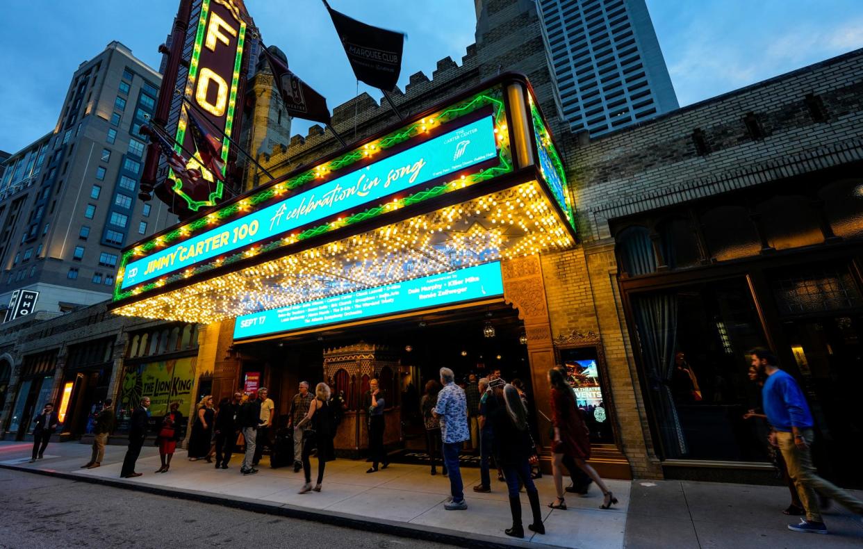 <span>People wait in line ahead of a ‘Jimmy Carter 100: A Celebration in Song’ concert at the Fox Theater in Atlanta on Tuesday.</span><span>Photograph: Mike Stewart/AP</span>