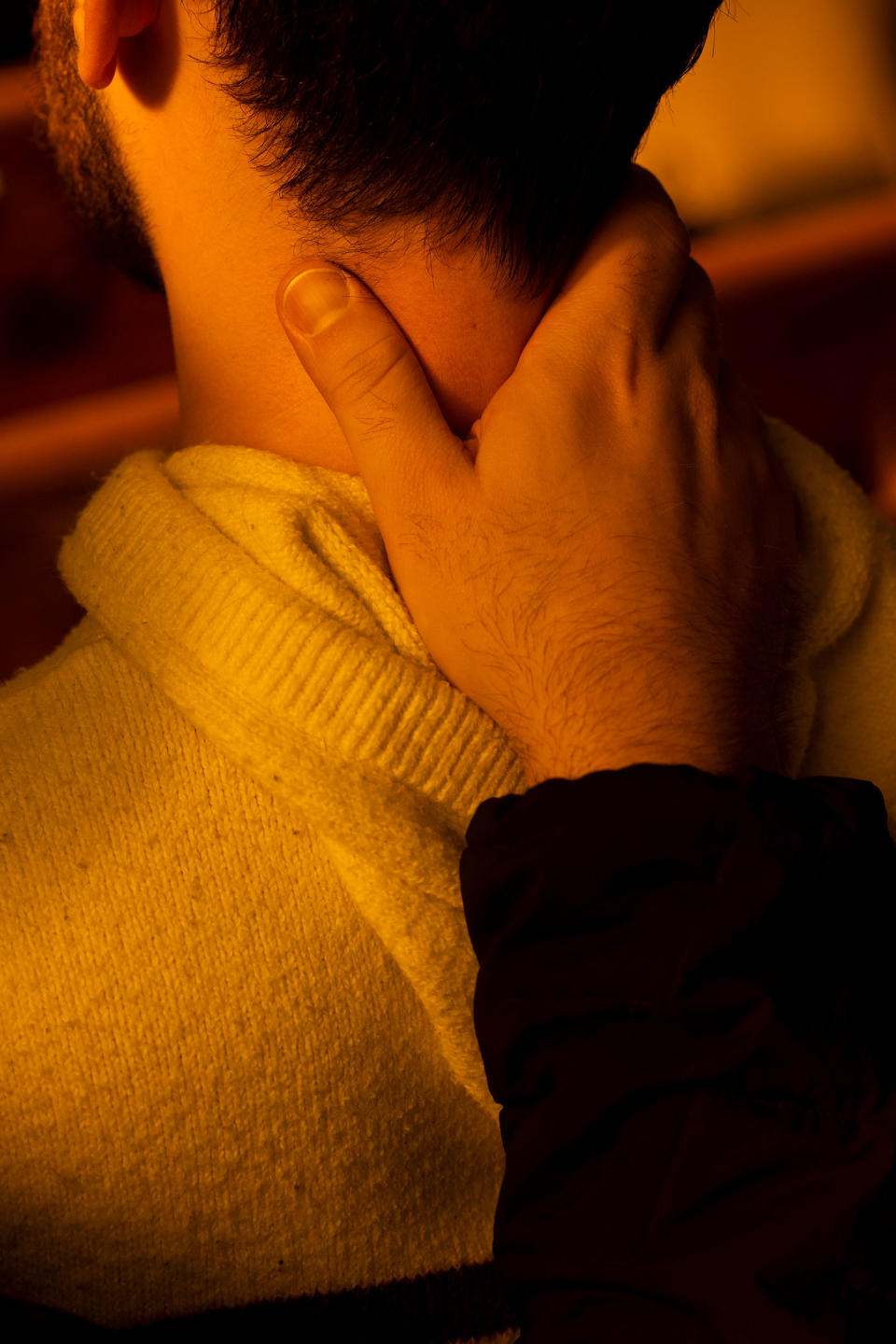 A couple caresses each other during a vigil in All Souls Unitarian Church in Colorado Springs, on Nov. 20. A vigil was held after a shooting at an L.G.B.T.Q. nightclub where at least five people were killed.<span class="copyright">Rachel Woolf—The Washington Post/Getty Images</span>