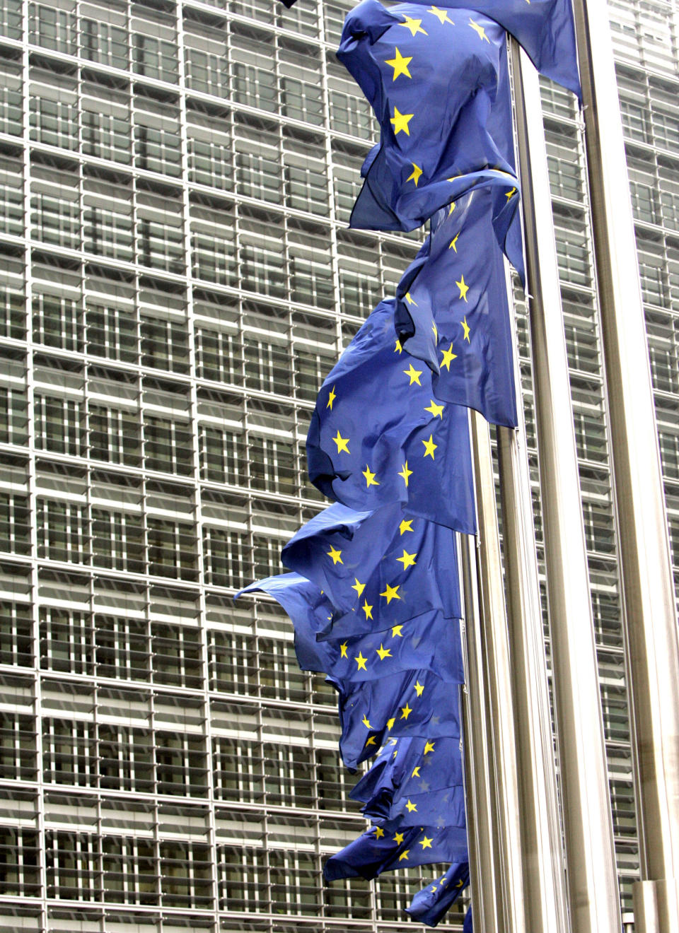 FILE In this Wednesday Nov. 8, 2006 file photo, European Union flags wave in the wind outside EU headquarters in Brussels. The European Union has won the Nobel Peace Prize, it has been announced on Friday, Oct. 12, 2012. (AP Photo/Virginia Mayo, File)