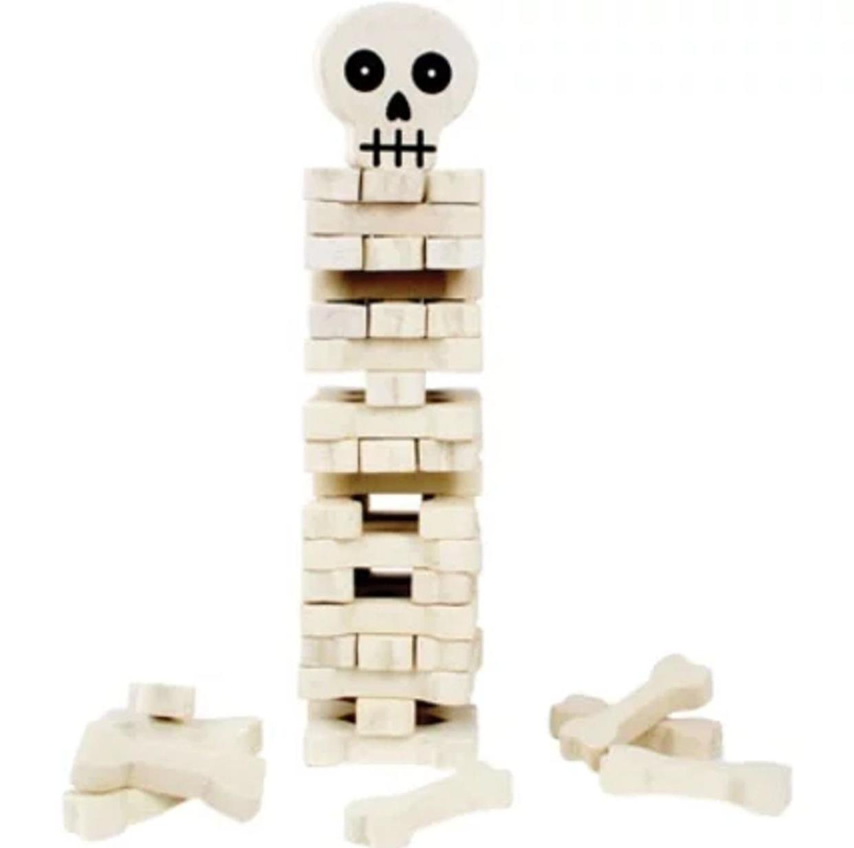 <p><a href="https://go.redirectingat.com?id=74968X1596630&url=https%3A%2F%2Fwww.walmart.com%2Fip%2FStack-the-Bones-Game%2F157968752&sref=https%3A%2F%2Fwww.countryliving.com%2Fshopping%2Fgifts%2Fg36957166%2Fbest-halloween-gifts%2F" rel="nofollow noopener" target="_blank" data-ylk="slk:Shop Now;elm:context_link;itc:0;sec:content-canvas" class="link rapid-noclick-resp">Shop Now</a></p><p>Stack the Bones Game</p><p>walmart.com</p><p>$38.76</p><span class="copyright">Walmart</span>