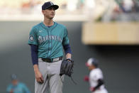 Seattle Mariners starting pitcher George Kirby stands on the mound after a solo home run by Minnesota Twins' Trevor Larnach during the first inning of a baseball game Wednesday, May 8, 2024, in Minneapolis. (AP Photo/Abbie Parr)