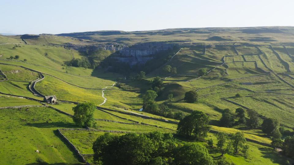 An aerial view of Malham Cove and the surrounding landscape (Ben Cherry/Silverback Films/PA)