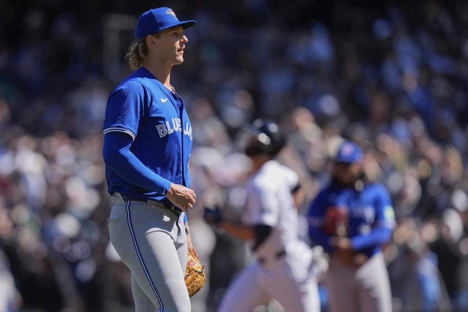 Toronto Blue Jays pitcher Bowden Francis reacts as New York Yankees' Giancarlo Stanton runs the bases after hitting a grand slam during the third inning of a baseball game Sunday, April 7, 2024, in New York. (AP Photo/Frank Franklin II)
