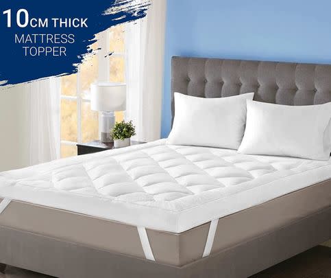 Add a layer of comfort to your bed with 30% off this thick hypoallergenic mattress topper and unlock endless nights of sweet dreams