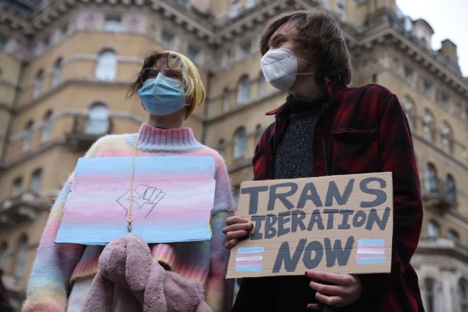 Two trans rights protesters outside the BBC’s headquarters in January 2022 (Hollie Adams/Getty Images)