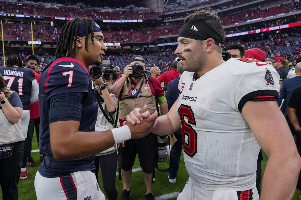 Houston Texans' C.J. Stroud (7) and Tampa Bay Buccaneers quarterback Baker Mayfield (6) talk following an NFL football game, Sunday, Nov. 5, 2023, in Houston. The Texans won 39-37. (AP Photo/Eric Gay)