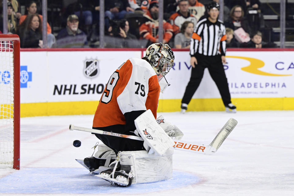 Philadelphia Flyers' goaltender Carter Hart is unable to make a save on a goal scored by Colorado Avalanche's Logan O'Connor during the first period of an NHL hockey game, Saturday, Jan. 20, 2024, in Philadelphia. (AP Photo/Derik Hamilton)