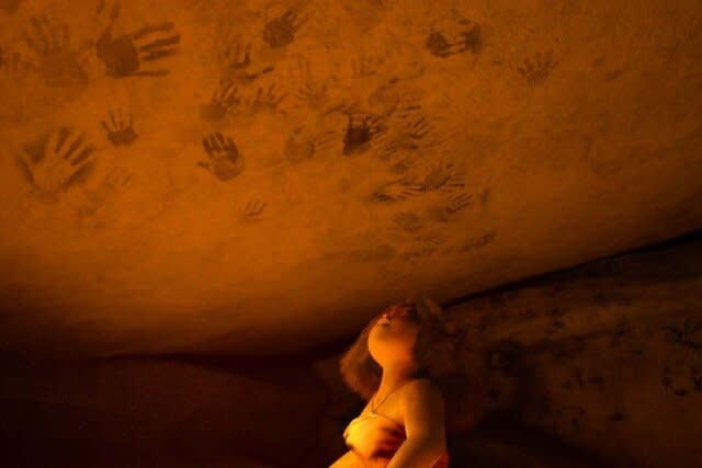 Eep looks up at cave Paintings in The Croods (2013)