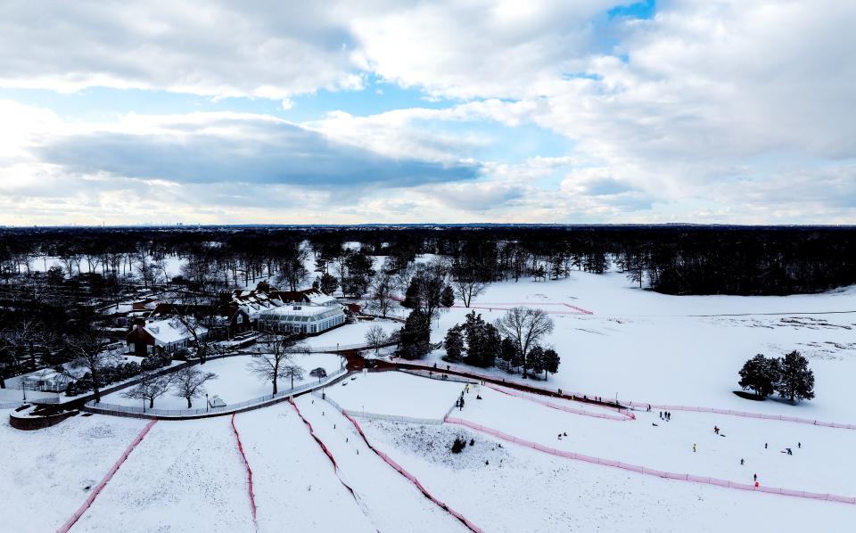 An aerial point of view of people sledding at Bethpage State Park on February 17, 2024 in Bethpage, New York.