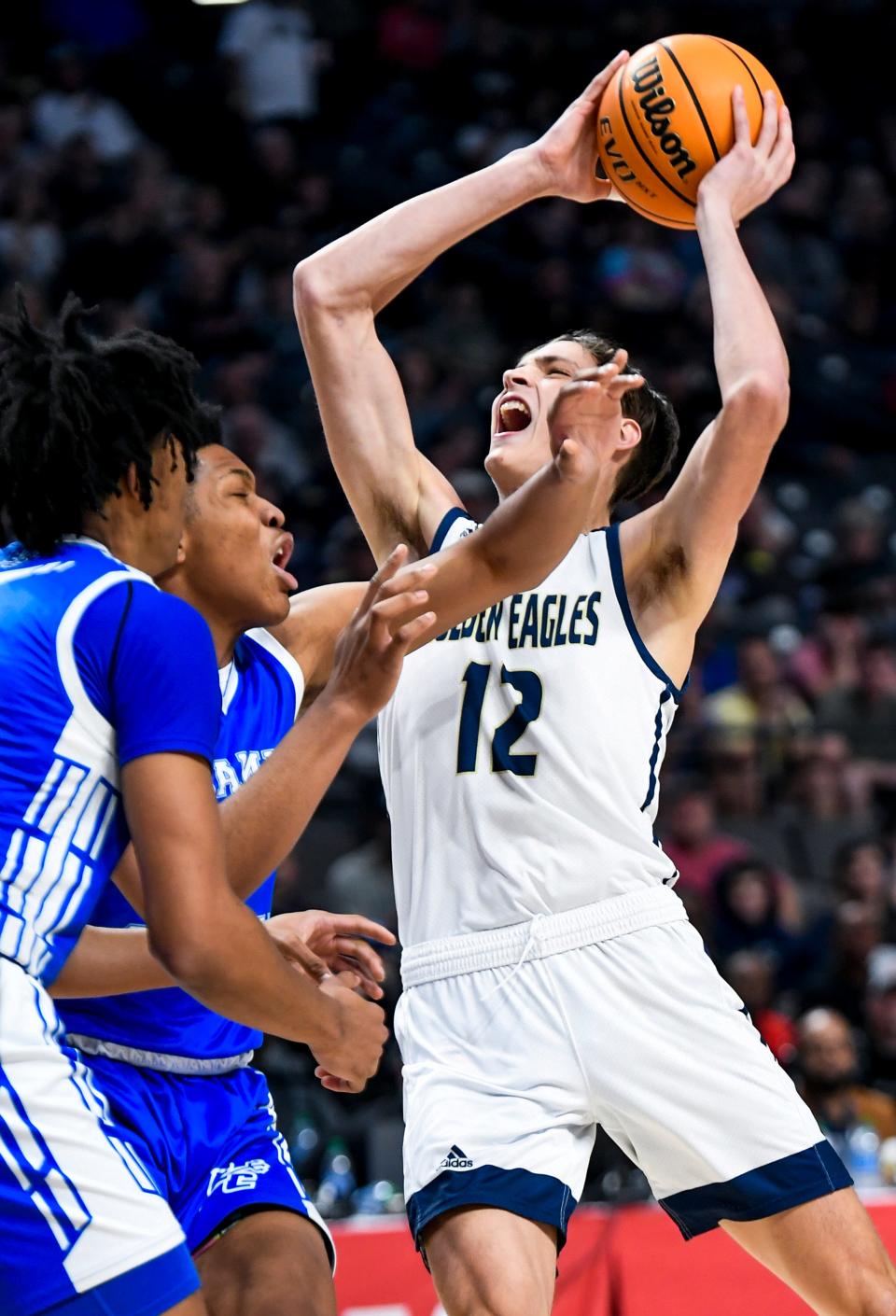 Jacksonville's Cade Phillips (12) goes to the hoop against Escambia County during their AHSAA Class 4A State Championship game at Legacy Arena in Birmingham, Ala., on Friday March 4, 2022.