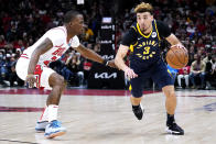 Indiana Pacers guard Chris Duarte, right, drives as Chicago Bulls forward Javonte Green defends during the first half of an NBA basketball game in Chicago, Monday, Nov. 22, 2021. (AP Photo/Nam Y. Huh)