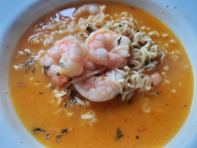 Among Faneek&#39;s most popular Say it With Soup items is the hot and spicy shrimp and ramen noodle soup.