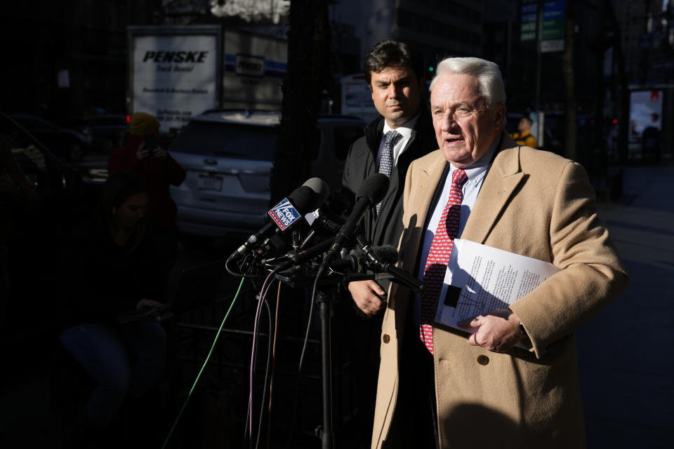 Attorney Bob Costello, right, talks to reporters after testifying before a grand jury investigating Donald Trump in New York, Monday, March 20, 2023. (AP Photo/Seth Wenig)