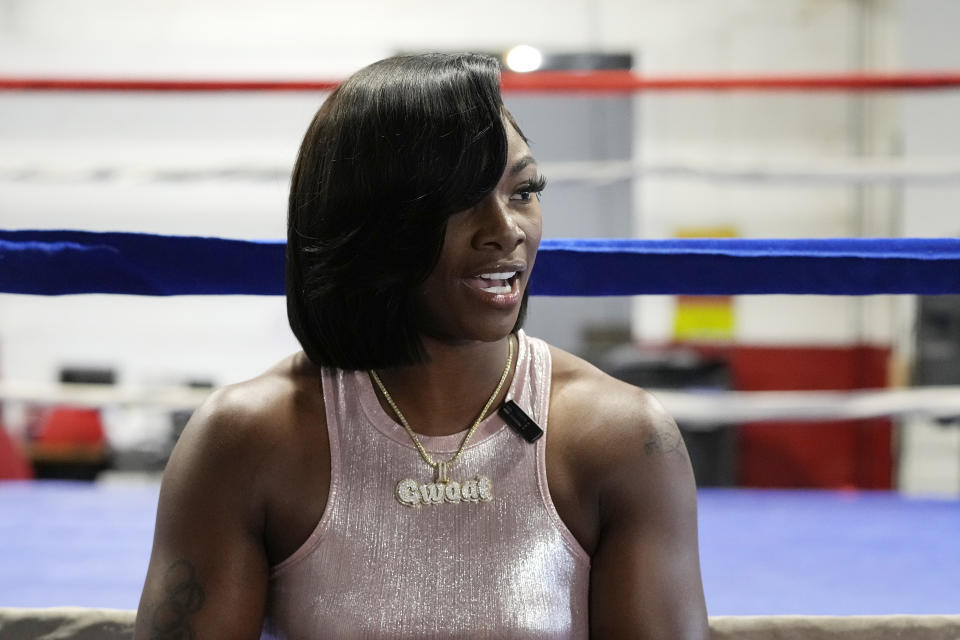 Claressa Shields is interviewed before a workout, Tuesday, May 30, 2023, in Detroit. Shields is perhaps in the prime of her career, establishing a big enough name as a two-time Olympic gold medalist and world champion in three weight classes to headline the first boxing card in the six-year history of Little Caesars Arena. The undisputed middleweight champion faces top-ranked contender Maricela Cornejo on Saturday. (AP Photo/Carlos Osorio)