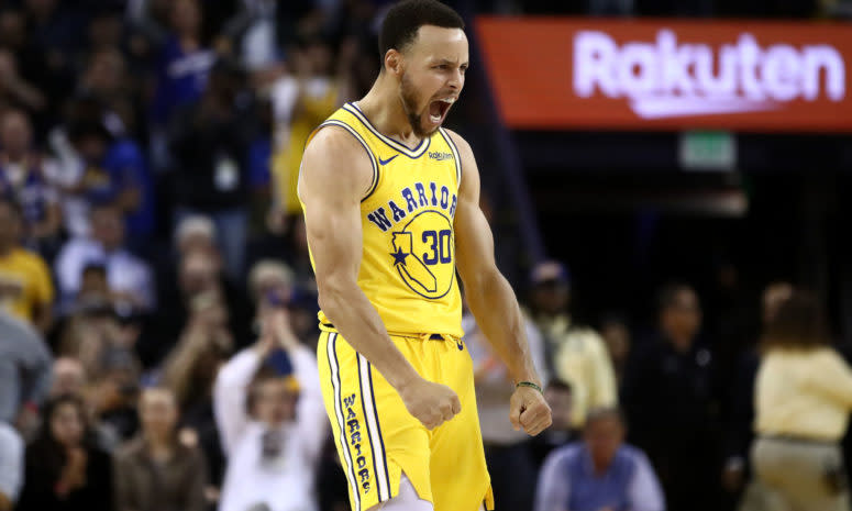 Stephen Curry celebrating during a game.