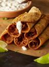 <p>These crispy, cheesy <a href="https://www.delish.com/cooking/g1393/traditional-mexican-food-0710/" rel="nofollow noopener" target="_blank" data-ylk="slk:Mexican;elm:context_link;itc:0;sec:content-canvas" class="link ">Mexican</a> taquitos are quick and easy to make—even if you don’t want to bust out the big bottle of oil. Instead, brush them with just a little oil, then bake them at 450° for around 15 minutes.</p><p>Get the <strong><a href="https://www.delish.com/cooking/recipe-ideas/a41395787/bean-and-cheese-taquitos-recipe/" rel="nofollow noopener" target="_blank" data-ylk="slk:Bean & Cheese Taquitos recipe;elm:context_link;itc:0;sec:content-canvas" class="link ">Bean & Cheese Taquitos recipe</a></strong>.</p>