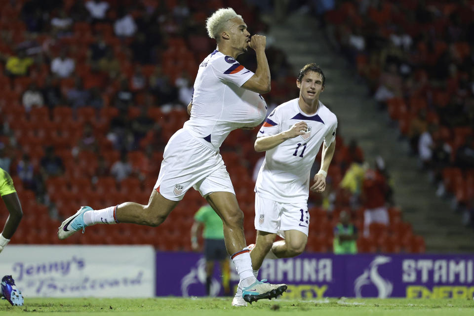 Antonee Robinson of the United States celebrates a goal against Trinidad and Tobago at Hasely Crawford Stadium on November 20, 2023 in Port of Spain, Trinidad and Tobago.