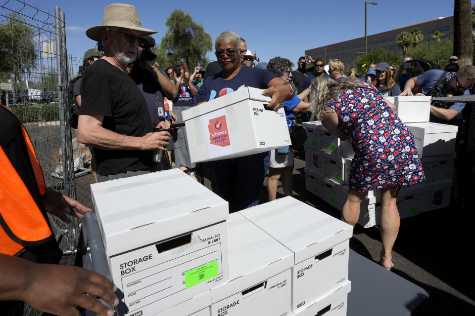 Arizona abortion-rights supporters deliver over 800,000 petition signatures to the capitol to get abortion rights on the November general election ballot Wednesday, July 3, 2024, in Phoenix. (AP Photo/Ross D. Franklin)