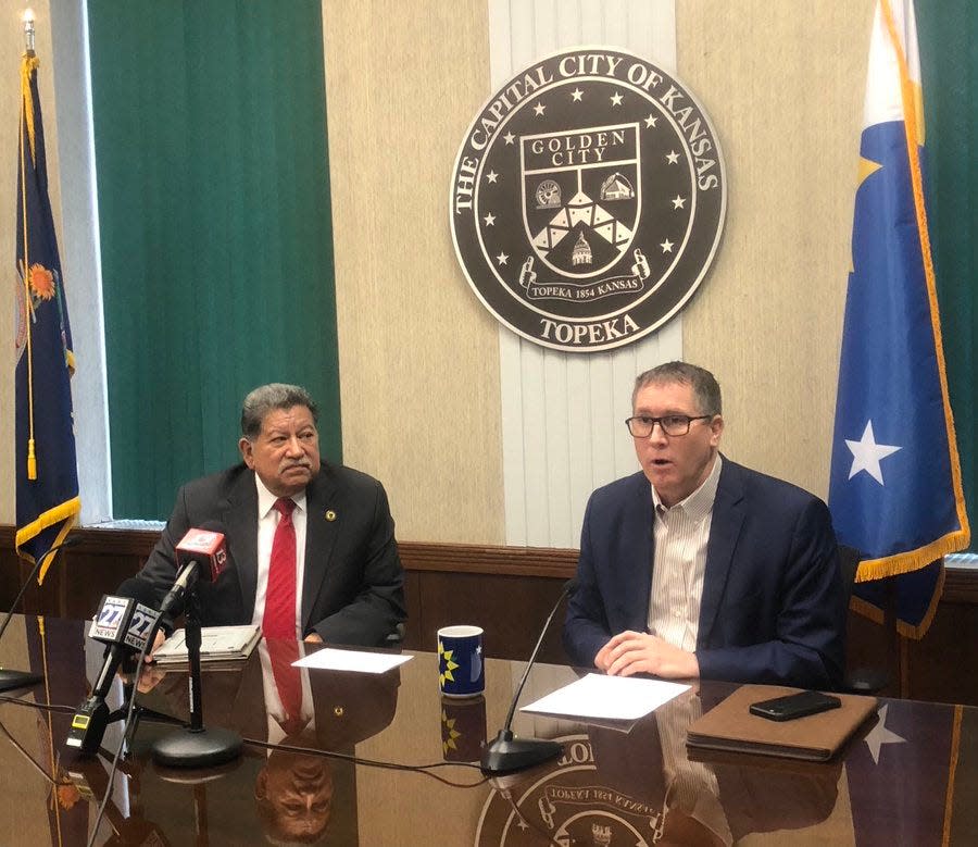 Mayor Mike Padilla, left, and city manager Stephen Wade on Tuesday encouraged anyone who sees couples and families struggling with domestic problems to let them know help is available.