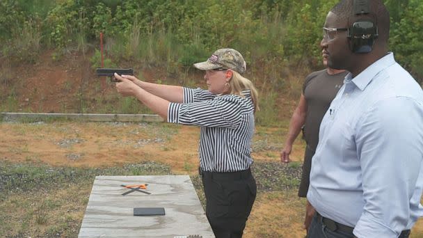 PHOTO: Ginger Chandler, the co-founder of LodeStar Works, firing one of the company's smart guns. (ABC)