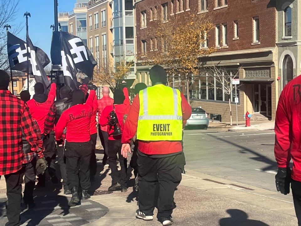 A group with iconography matching the neo-Nazi group "Blood Tribe" marches in downtown Madison on Saturday, Nov. 18.