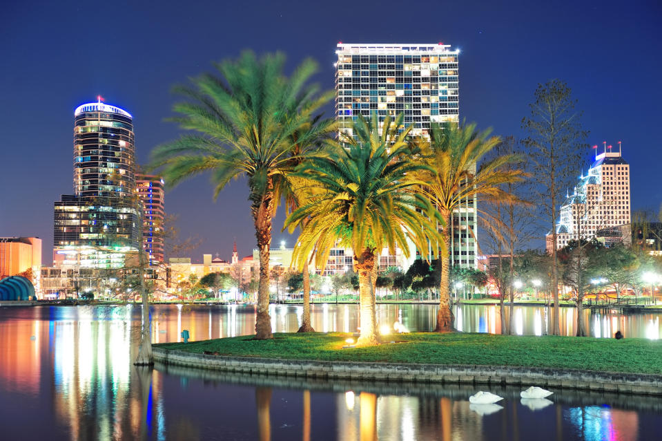 skyline of Orlando, FL. featuring office buildings and palm trees