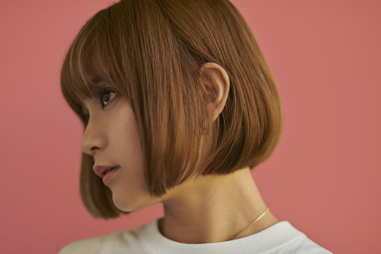 Woman with short hair brown hair