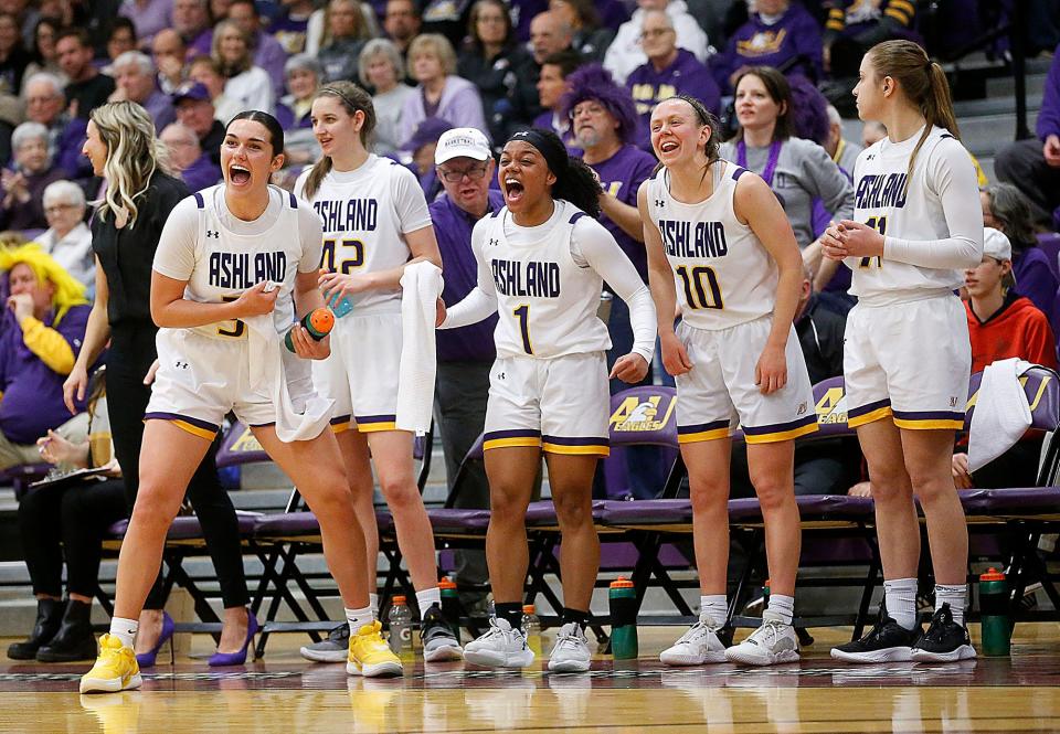 Ashland University's bench celebrates after a shot is made against Trevecca Nazarene during a NCAA Midwest Regional semifinal, Saturday, March 11, 2023 at Kates Gymnasium.