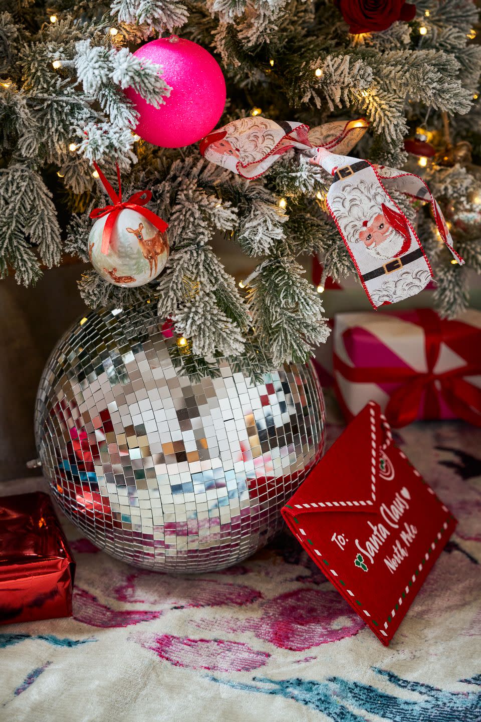 mirror disco ball underneath christmas tree