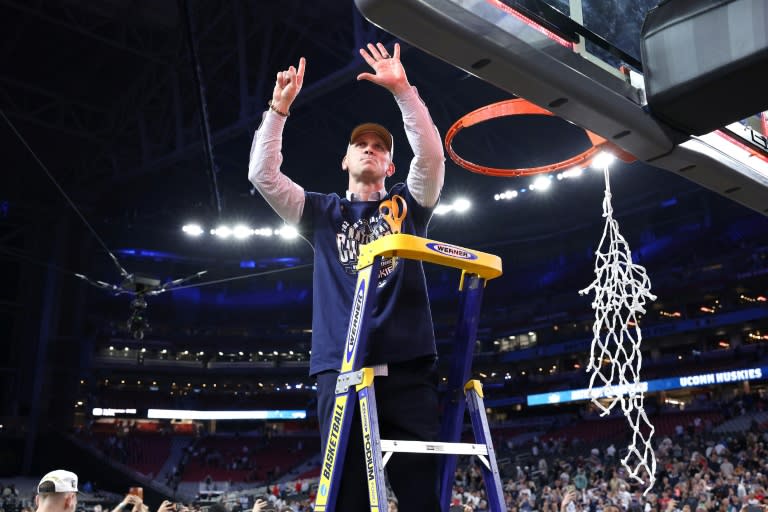 University of Connecticut head coach Dan Hurley, shown celebrating the team's second consecutive US college crown, has turned down a $70 million offer from the NBA's <a class="link " href="https://sports.yahoo.com/nba/teams/la-lakers/" data-i13n="sec:content-canvas;subsec:anchor_text;elm:context_link" data-ylk="slk:Los Angeles Lakers;sec:content-canvas;subsec:anchor_text;elm:context_link;itc:0">Los Angeles Lakers</a> to remain coach at the school (JAMIE SQUIRE)