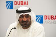 Sheikh Ahmed bin Saeed Al Maktoum, the chairman and CEO of the Dubai-based long-haul carrier Emirates, speaks at a news conference at the Dubai Airshow in Dubai, United Arab Emirates, Monday, Nov. 18, 2019. Emirates announced Monday a new order for 20 additional wide-body Airbus A350-900 planes in a deal worth $6.4 billion. This brings the airline's total order for the aircraft to 50 Airbus A350s costing $16 billion at list price. (AP Photo/Jon Gambrell)