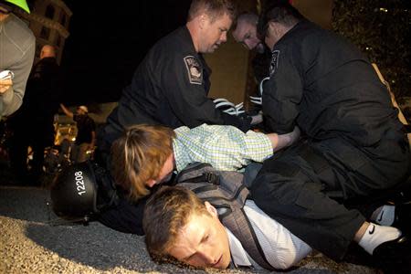 Protesters are arrested in Boston, Massachusetts October 11, 2011. REUTERS/Yusuke Suzuki