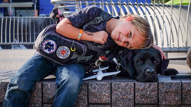 Luke has had Type 1 diabetes since the age of two, and Jedi has been trained to bow each time his levels change. Photo: Black Dogs Rule