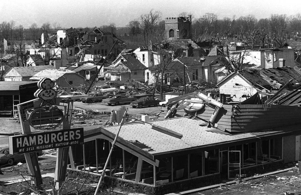 FILE - Tornado destruction in Xenia, Ohio is shown in an April 4, 1974 photo. The deadly tornado killed 32 people, injured hundreds and leveled half the city of 25,000. Nearby Wilberforce was also hit hard. As the Watergate scandal unfolded in Washington, President Richard Nixon made an unannounced visit to Xenia to tour the damage. Xenia's was the deadliest and most powerful tornado of the 1974 Super Outbreak. (AP Photo, file)