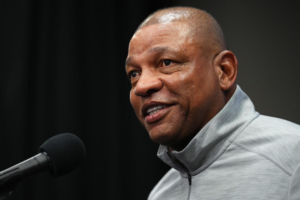 Philadelphia 76ers head coach Doc Rivers speaks to the media before a preseason NBA basketball game against the Brooklyn Nets, Monday, Oct. 11, 2021, in Philadelphia. Rivers says the franchise still wants disgruntled All-Star guard Ben Simmons to the return to the team. (AP Photo/Matt Slocum)