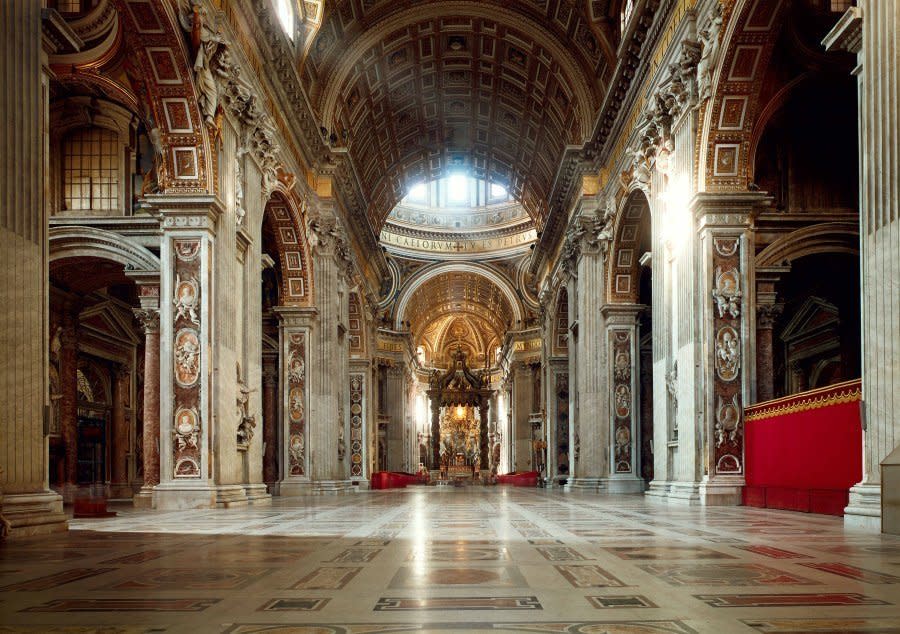 <em>Designed by Michelangelo, among others, and completed in 1626.</em><br>  "Work on the new basilica lasted 120 years and cost so much that the sale of 'indulgences' contributed to increasing religious opposition to the Roman Catholic church and to the rise of Martin Luther."  