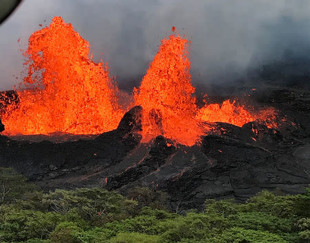 A lava fountain is observed from a helicopter flight over the Fissure 22 in Kilauea Volcano's Lower East Rift Zone during ongoing eruptions of the Kilauea Volcano in Hawaii, U.S. May 21, 2018. Picture taken on May 21, 2018. USGS/Handout via REUTERS