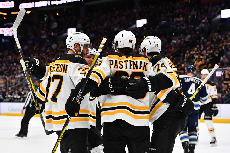 COLUMBUS, OHIO - OCTOBER 28: David Pastrnak #88 of the Boston Bruins celebrates with teammates after scoring a goal during the second period of a game against the Columbus Blue Jackets at Nationwide Arena on October 28, 2022 in Columbus, Ohio. (Photo by Ben Jackson/NHLI via Getty Images)