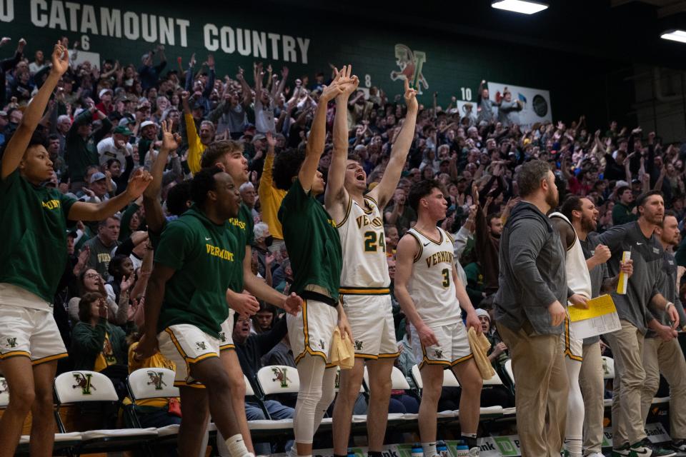 The University of Vermont bench celebrates during its 66-65 buzzer-beating win over Yale on Dec. 2, 2023 at Patrick Gym.