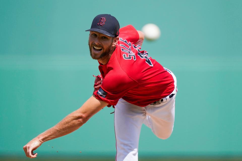 Boston Red Sox starting pitcher Chris Sale throws in the first inning of their spring training baseball game against the Detroit Tigers in Fort Myers, Fla., Monday, March 6, 2023. (AP Photo/Gerald Herbert)