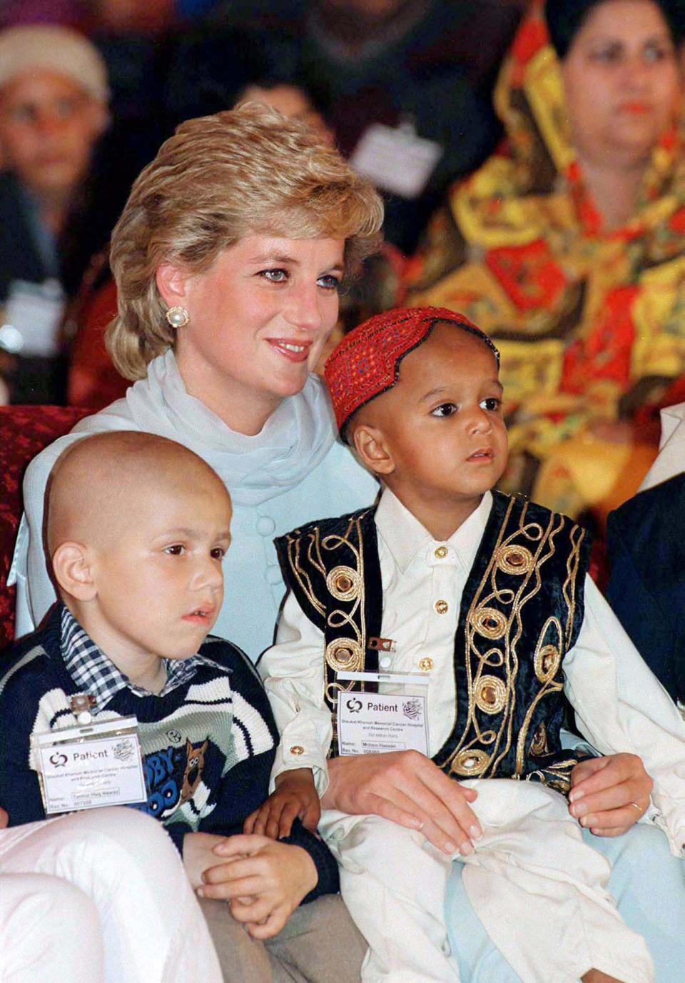 In Pakistan in 1996, a year before her death, with two young cancer patients