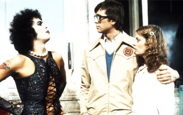 Tim Curry, Barry Bostwick, and Susan Sarandon in a scene from <em>The Rocky Horror Picture Show</em>, directed by Jim Sharman.