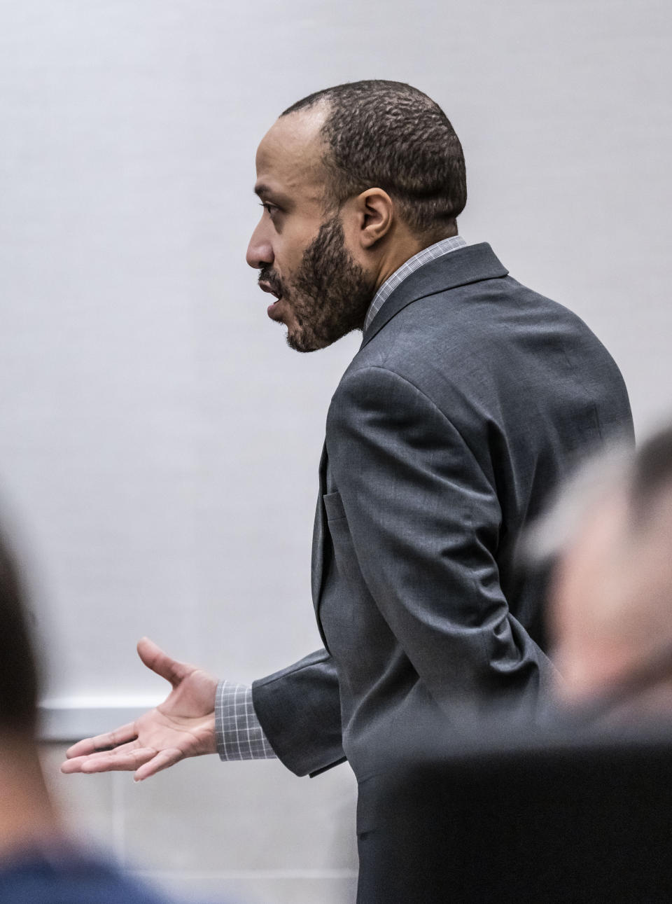 Defendant Darrell Brooks questions his witness, Nicholas Kirby during his trial in a Waukesha County Circuit Court in Waukesha, Wis., on Thursday, Oct. 20, 2022. Brooks, who is representing himself during the trial, is charged with driving into a Waukesha Christmas Parade last year, killing six people and injuring dozens more. (Scott Ash/Milwaukee Journal-Sentinel via AP, Pool)