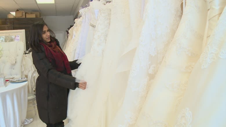 Scores of women searching for their wedding gowns as consignment store shuts its doors