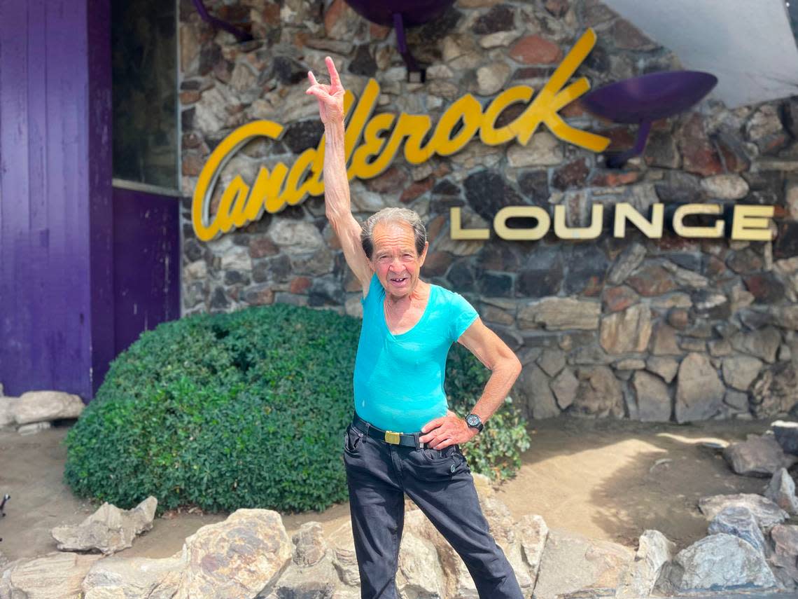 Kenny the Dancing Man, whose real name is Kenny Buchanan, strikes a pose outside Country Club Lanes Bowling Alley in Arden Arcade on Tuesday, Aug. 9, 2022.