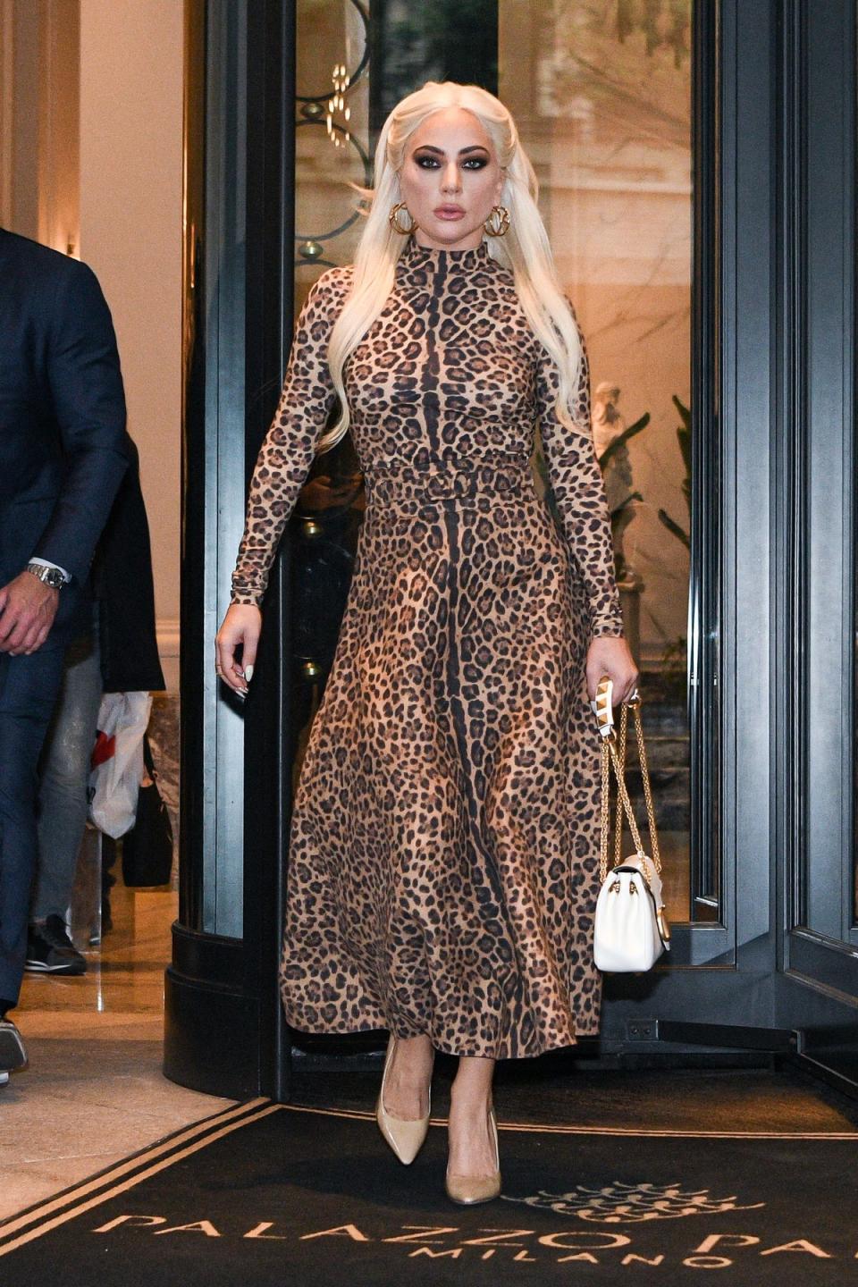 Lady Gaga on the ‘House of Gucci’ press tour wearing Valentino (AFP via Getty Images)