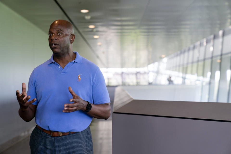 Aaron Bryant, museum curator of photography, visual culture and contemporary history at the Smithsonian Institution's National Museum of African American History and Culture, talks to the Associated Press about the Rev. Martin Luther King Jr.'s original speech from the 1963 March on Washington for Jobs and Freedom, Friday, Aug. 18, 2023, in Washington. (AP Photo/Stephanie Scarbrough)