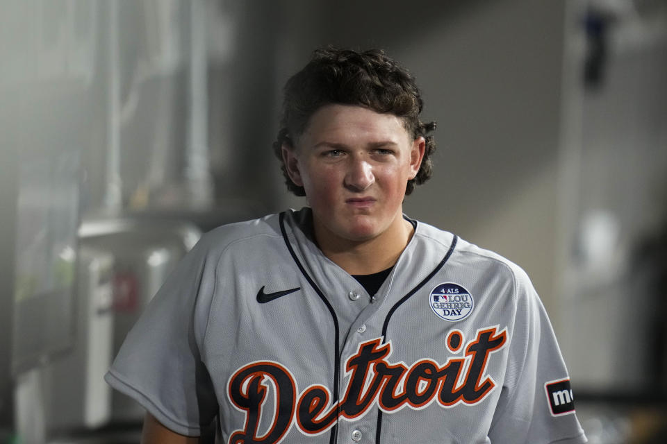 Detroit Tigers starting pitcher Reese Olson walks in the dugout after he was pulled during the sixth inning against the Chicago White Sox in a baseball game, his debut in the majors, Friday, June 2, 2023, in Chicago. (AP Photo/Erin Hooley)