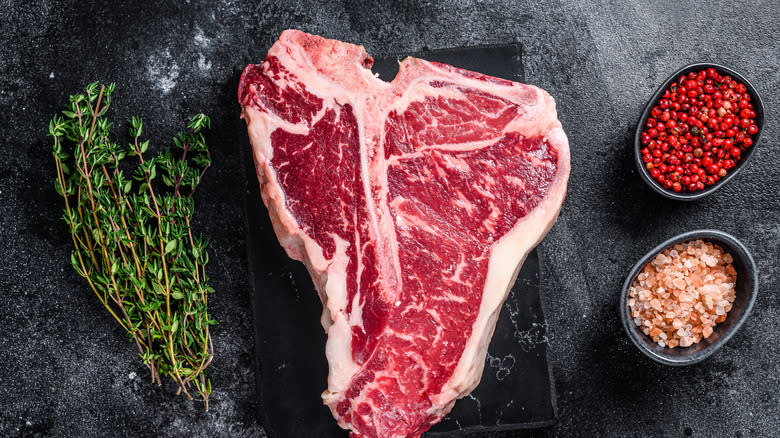 A raw T-bone steak.